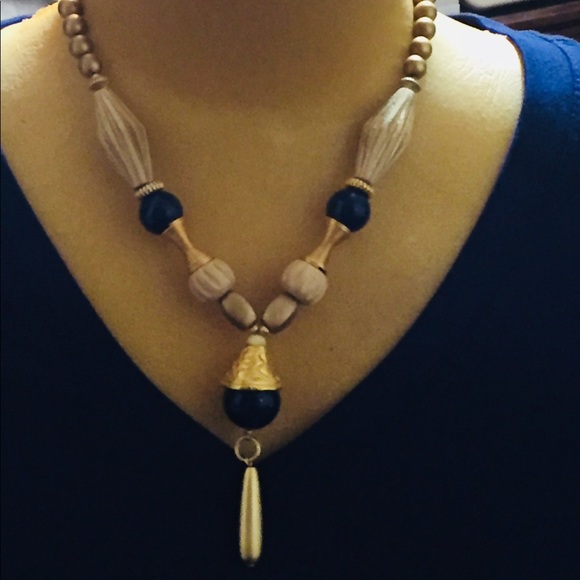 Jewelry - A navy blue and gold necklace